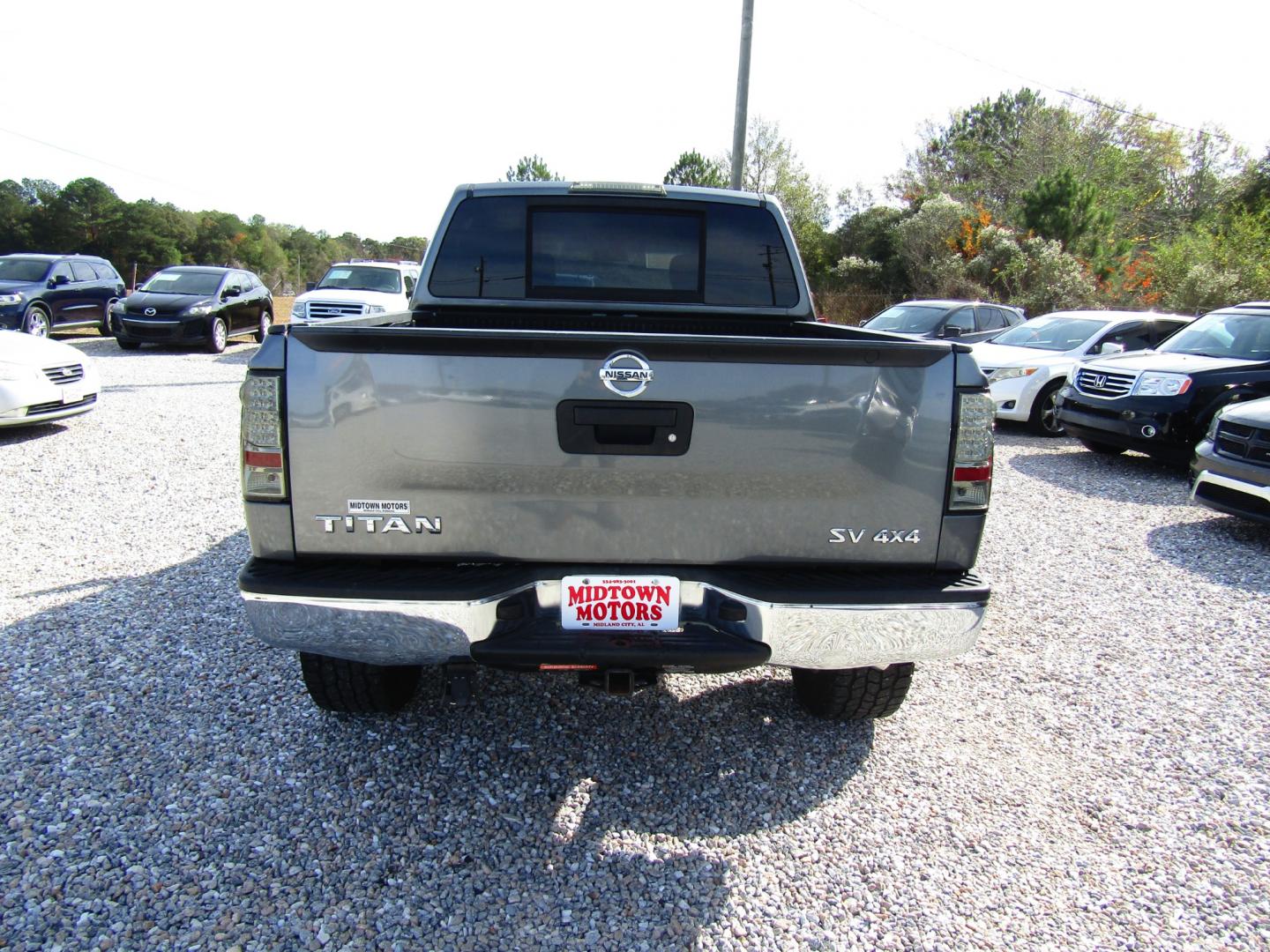 2013 Gray /Gray Nissan Titan SV Crew Cab 4WD (1N6AA0EJ3DN) with an 5.6L V8 DOHC 32V engine, Automatic transmission, located at 15016 S Hwy 231, Midland City, AL, 36350, (334) 983-3001, 31.306210, -85.495277 - Photo#6